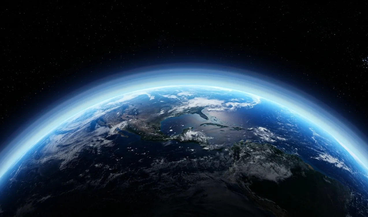 From space, the air shows up as faint blue bands wrapped around the planet. A high layer called the stratosphere has been slowly getting colder for decades. Image: NASA / ISS Expedition 66.